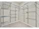Spacious walk-in closet with carpeted floor and adjustable wire shelving at 2623 Bloom Cir, Tucker, GA 30084