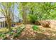 Picturesque backyard showcasing well-manicured landscaping and a private outdoor area at 356 Ivy Glen Cir, Avondale Estates, GA 30002
