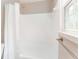 Clean bathroom with a white shower curtain, tiled walls, and a modern shower head at 356 Ivy Glen Cir, Avondale Estates, GA 30002