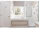 Elegant bathroom with a glass-enclosed shower and a soaking tub, all in a bright white color scheme at 356 Ivy Glen Cir, Avondale Estates, GA 30002