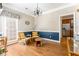 Inviting dining room featuring hardwood floors, classic trim, and comfortable seating next to an open doorway at 356 Ivy Glen Cir, Avondale Estates, GA 30002