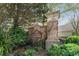 Brick entrance to Ivy Hill established in 1996 with mature landscaping surrounding the sign and columns at 356 Ivy Glen Cir, Avondale Estates, GA 30002