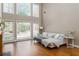 Bright living room featuring large windows and hardwood floors with comfortable seating at 356 Ivy Glen Cir, Avondale Estates, GA 30002