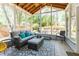 Covered patio with comfortable seating provides a relaxing space for entertaining guests at 356 Ivy Glen Cir, Avondale Estates, GA 30002