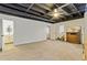 Spacious bedroom with carpet floors, light walls, and dresser at 8445 Vernon Grove Rd, Chattahoochee Hills, GA 30268