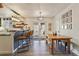 Eat-in kitchen/dining area with counter seating and dining table at 8445 Vernon Grove Rd, Chattahoochee Hills, GA 30268