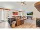Comfortable living room featuring modern decor, wood floors, and natural light at 8445 Vernon Grove Rd, Chattahoochee Hills, GA 30268