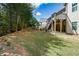 Exterior shot showcasing deck and lush backyard at 110 Mountain Laurel Ct, Canton, GA 30114