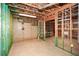 Spacious unfinished basement featuring open framing, shelving, and plenty of potential at 110 Mountain Laurel Ct, Canton, GA 30114
