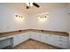 Spacious bathroom with a long vanity, granite countertop, and ample storage at 110 Mountain Laurel Ct, Canton, GA 30114