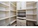 Organized closet with custom shelving and drawers for ample storage at 110 Mountain Laurel Ct, Canton, GA 30114