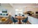 Cozy dining area with modern light fixture next to the beautiful kitchen at 110 Mountain Laurel Ct, Canton, GA 30114