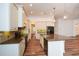 Kitchen featuring granite countertops, stainless steel appliances, and hardwood floors at 110 Mountain Laurel Ct, Canton, GA 30114