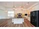 Kitchen featuring a center island, granite countertops, and stainless steel appliances at 110 Mountain Laurel Ct, Canton, GA 30114