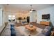 A spacious living room features an open concept, neutral tones, and plenty of natural light at 110 Mountain Laurel Ct, Canton, GA 30114