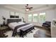 Bright main bedroom with tray ceiling and luxurious furnishings at 110 Mountain Laurel Ct, Canton, GA 30114