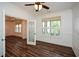 Office featuring white walls, hardwood floors, and a glass door at 110 Mountain Laurel Ct, Canton, GA 30114