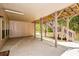 Wide-angle view of covered patio featuring stairs to upper level and level backyard at 110 Mountain Laurel Ct, Canton, GA 30114