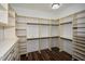 The large walk-in closet provides ample storage and organization space at 110 Mountain Laurel Ct, Canton, GA 30114