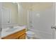 Clean, well-maintained bathroom with a shower-tub combo at 2782 Laurel Valley Trl, Buford, GA 30519