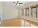 Bright, spacious bedroom featuring hardwood floors and multiple windows at 2782 Laurel Valley Trl, Buford, GA 30519