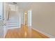 Inviting entryway with hardwood floors and staircase leading to upper level at 2782 Laurel Valley Trl, Buford, GA 30519