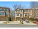 Attractive townhome complex features brick facade, individual driveways and garages at 2782 Laurel Valley Trl, Buford, GA 30519