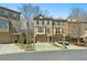 Attractive townhome complex features brick facade, individual driveways and garages at 2782 Laurel Valley Trl, Buford, GA 30519