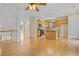Spacious kitchen featuring a center island, hardwood floors and pendant lights at 2782 Laurel Valley Trl, Buford, GA 30519
