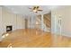 Bright and airy living room with hardwood floors and modern fireplace at 2782 Laurel Valley Trl, Buford, GA 30519