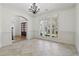 Spacious dining room with large windows offering plenty of natural light and stylish trim at 6230 Hampton Highlands Dr, Cumming, GA 30041