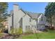 Exterior of home showing backyard, patio and lush landscaping at 6230 Hampton Highlands Dr, Cumming, GA 30041