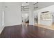 Expansive living area featuring high ceilings, an open layout, and hardwood floors at 6230 Hampton Highlands Dr, Cumming, GA 30041