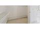 A walk-in closet is shown with white wire shelving and provides ample storage space at 6230 Hampton Highlands Dr, Cumming, GA 30041