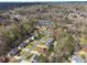 A beautiful aerial view showcases the neighborhood and its tree-lined streets at 708 Larkspur Nw Blvd, Acworth, GA 30102
