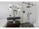 Modern bathroom with glass-enclosed shower, floating vanity, and freestanding tub at 708 Larkspur Nw Blvd, Acworth, GA 30102