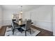 Dining room with modern table, stylish chairs, decorative lighting and elegant finishes at 708 Larkspur Nw Blvd, Acworth, GA 30102
