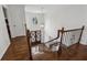 Bright two-story foyer with dark hardwood floors and a decorative chandelier at 708 Larkspur Nw Blvd, Acworth, GA 30102