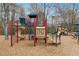 Community playground with slides, climbing structures, and a safety surface at 708 Larkspur Nw Blvd, Acworth, GA 30102