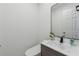 Clean half-bathroom with modern fixtures and a beautiful sink at 708 Larkspur Nw Blvd, Acworth, GA 30102