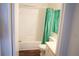 Bathroom with tiled shower and tub, white fixtures and ample counter space at 2211 Surrey Se Ct, Marietta, GA 30067