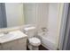 This is a bathroom with a shower, bathtub, mirror, sink and toilet all in one room at 2211 Surrey Se Ct, Marietta, GA 30067