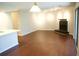 Charming living area with tiled fireplace, track lighting and sliding glass doors to private balcony at 2211 Surrey Se Ct, Marietta, GA 30067