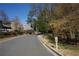 Scenic street view with mature trees and landscaping, showing the tranquil neighborhood and well-maintained surroundings at 2211 Surrey Se Ct, Marietta, GA 30067