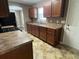Functional kitchen with stainless steel appliances and wood cabinetry at 2938 Palm Dr, Atlanta, GA 30344
