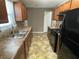 Functional kitchen with stainless steel appliances and ample counter space at 2938 Palm Dr, Atlanta, GA 30344