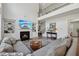 Living area features a fireplace, built-in shelving, and a stairway to the second level at 3878 Amicus Dr, Buford, GA 30519