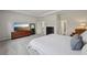 Spacious main bedroom with a TV over dresser, and an adjacent sitting area for relaxing at 3878 Amicus Dr, Buford, GA 30519