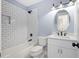 Updated bathroom with subway tile in shower, new vanity and fixtures at 5225 Maple Valley Sw Rd, Mableton, GA 30126