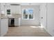 Updated kitchen with stainless appliances and lots of natural light from large window at 5225 Maple Valley Sw Rd, Mableton, GA 30126
